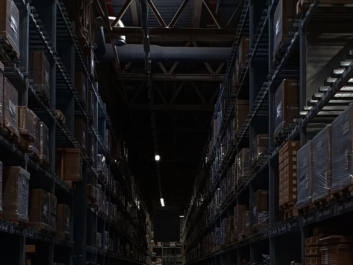 Warehouse aisle, cool light