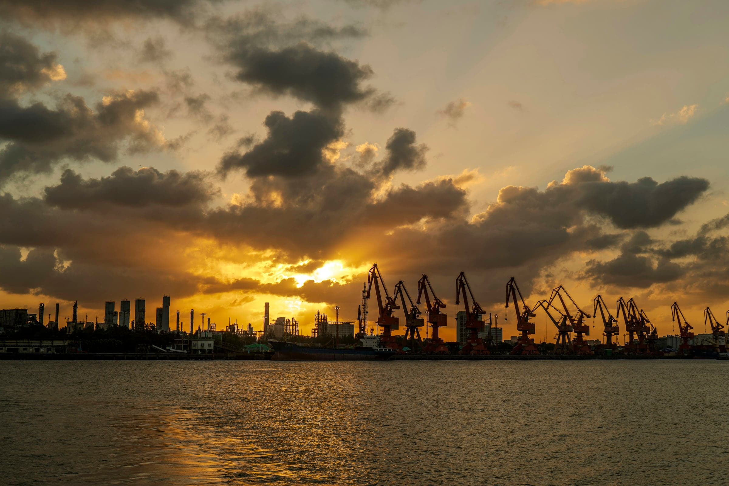 Harbour cranes at sunset
